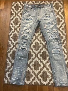 Men's Distressed Light Blue Ripped Jeans